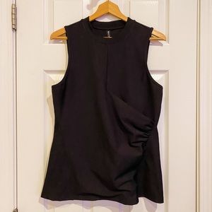 Athleta sleeveless shirt w/ rouching across the front and down the side